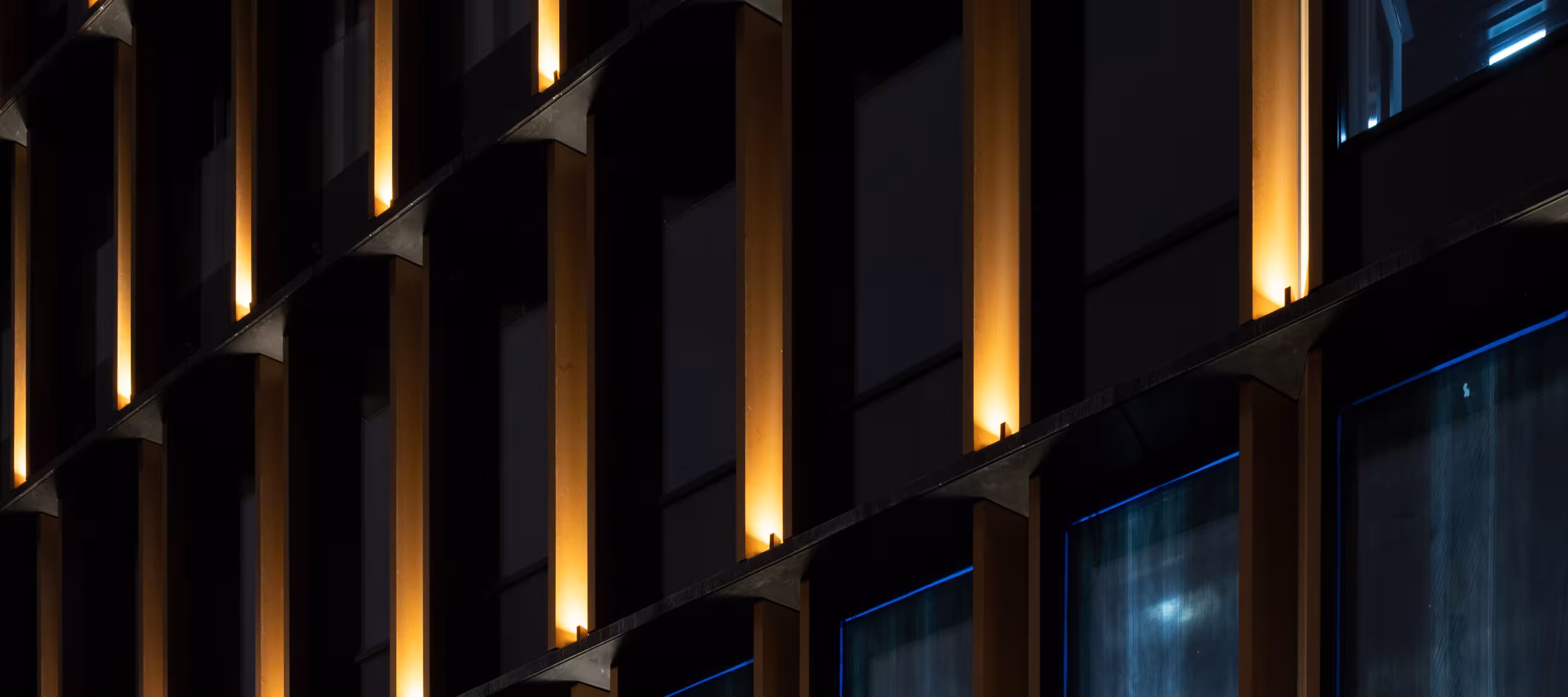 I'm pretty sure this is an apartment building at night. But to be honest, it could also be a closeup of like, a box or something.