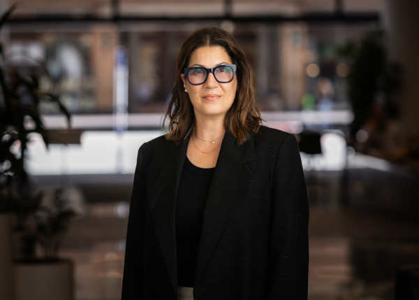 Carmel Cule just doing her thing. Hanging out in the lobby, getting her staff photo taken. The results speak for themselves.