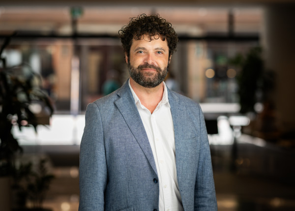 Rhys standing in the lobby trying to look tidy