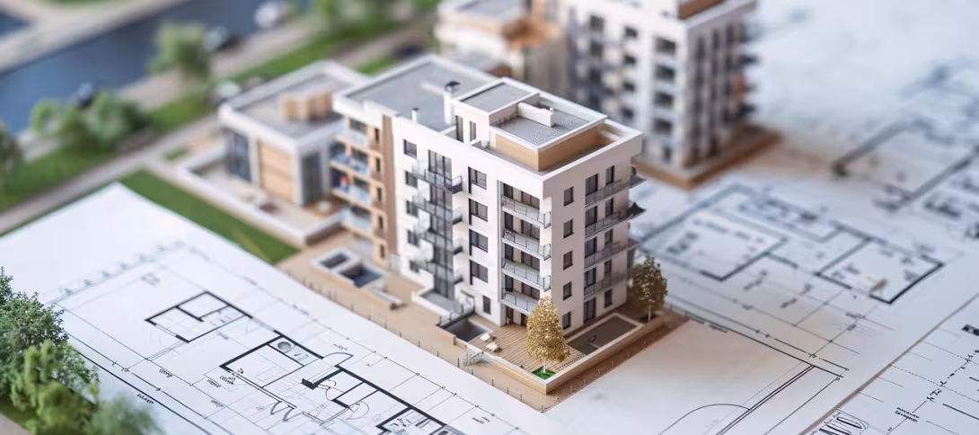 architectural model on plans with small fake trees